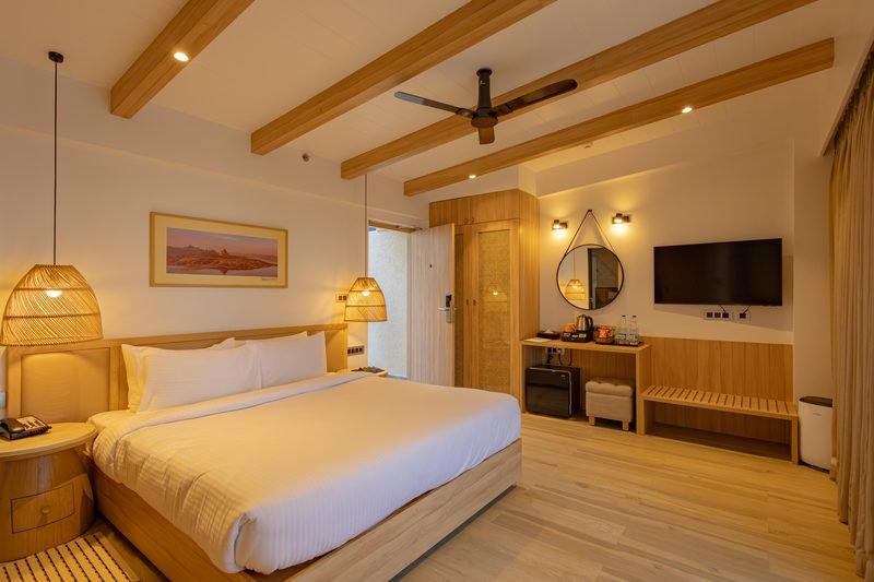 A guest room with wooden beams
